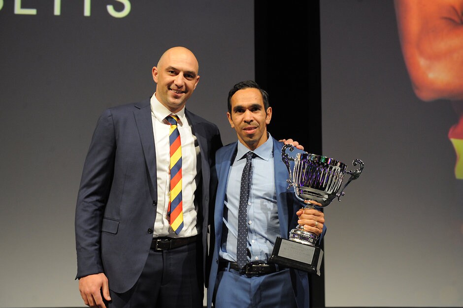Adelaide 2016 - Club Champion James Podsiadly presents Eddie Betts with the Phil Walsh Best Team Man Award (Photo: Adelaide Crows FC)